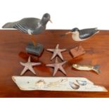 A collection of animal sculptural pieces