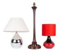 A group of three modern table lamps
