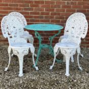 A suite of bistro-style garden furniture