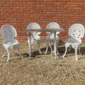A set of white-painted aluminium garden furniture