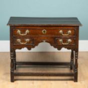 An 18th century oak lowboy