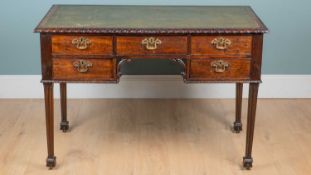 An Edwardian mahogany writing desk