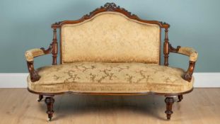 A Victorian walnut sofa