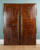 A pair of French yew wood armoire doors