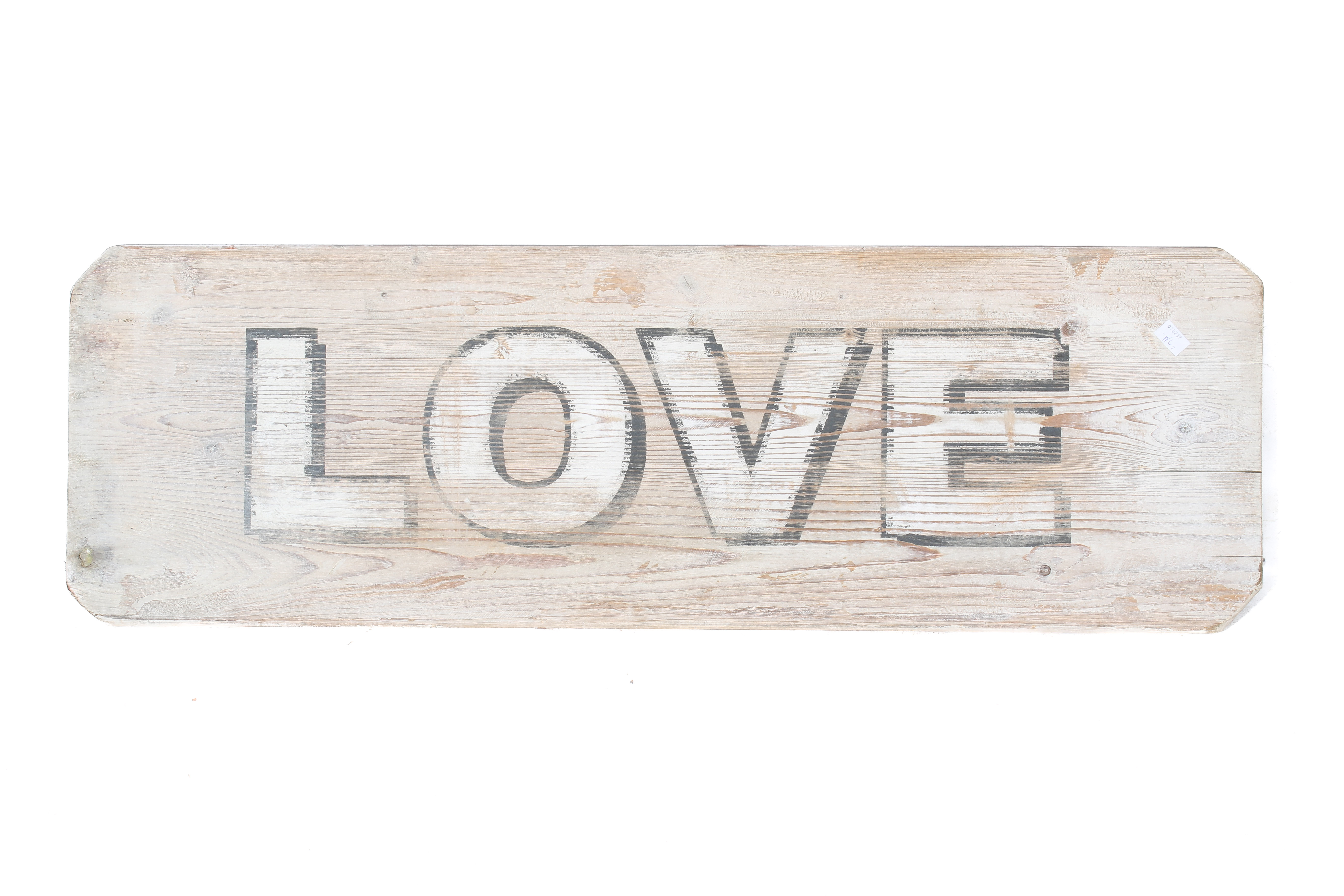 A rustic wooden 'Love' sign. Painted in black and white on a rectangular board, 32cm x 97.