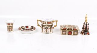 Five pieces of Royal Crown Derby porcelain.