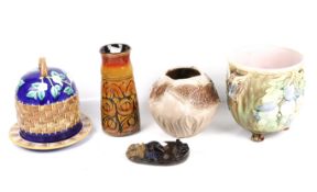 Five pieces of mid-century pottery. Comprising a figural mask, H14.