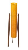 A 1960s orange/yellow fibre glass 'rocket lamp'. Raised on three wooden supports.