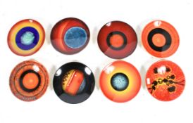 Eight Poole limited edition plates from 'The Planets' series.