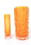 Two Geoffrey Baxter for Whitefriars 'bark' glass vases. Circa 1960s, both in tangerine orange, H15.