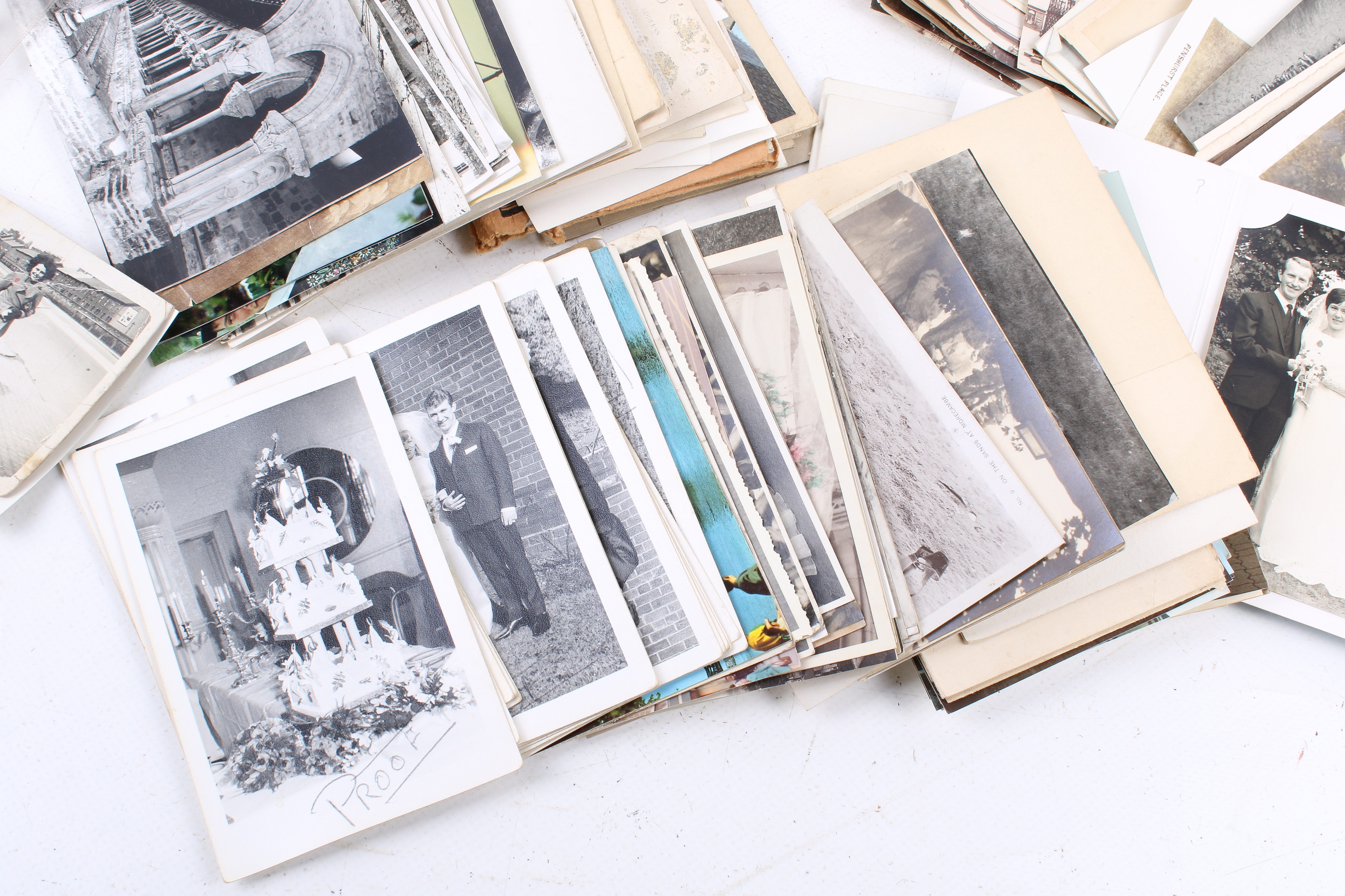 A box of antique and vintage photographs and postcards. - Image 4 of 4