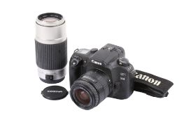 A Canon EOS 33V 35mm SLR camera outfit. With two lenses; a Sigma UC Zoom 28-70mm f3.5-4.