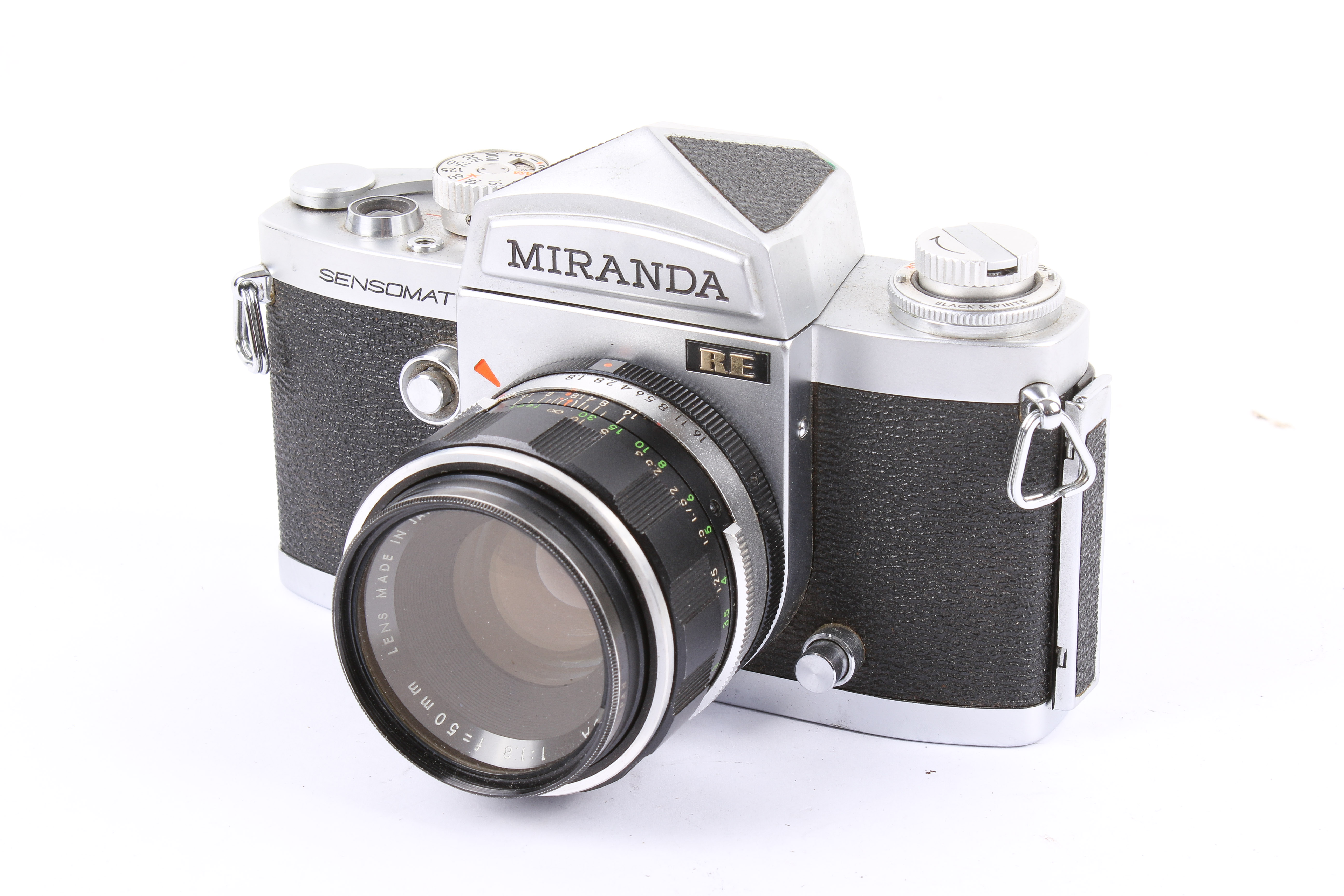 A Miranda Sensomat RE 35mm SLR camera. Chrome. With a Miranda 50mm f1.8 lens, cap and ERC. - Image 2 of 4