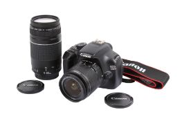 A Canon EOS 1100D Digital SLR camera outfit. With two lenses; a Canon EF-S 18-55mm f3.5-5.