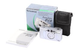 A Fujifilm Zoom Date f2.8 35mm Compact camera. With a Fujinon Zoom 24-50mm f2.