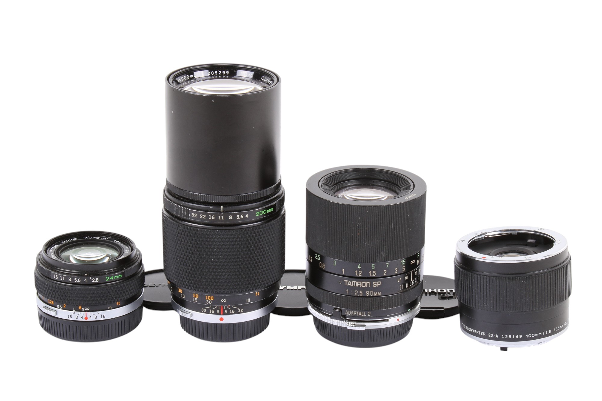 Three Olympus OM-mount lenses. To include an Olympus OM 24mm f2.