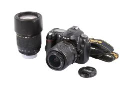 A Nikon D50 Digital SLR camera outfit. With two lenses; an AF-S Nikkor 18-55mm f3.5-5.