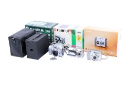 Three Compact Digital cameras.