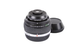 An Olympus OM 20mm f2 Zuiko Auto-Macro lens. Serial number 103716. With front and rear caps.