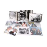 A collection of vintage and modern black and white and colour photographs.