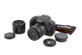 A Canon EOS 500D Digital SLR camera outfit. With two lenses; a Canon EF-S 18-55mm f3.5-5.