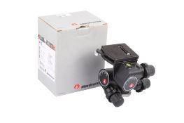 A Manfrotto 410 Junior Geared Head. Together with quick release plate, instructions and makers box.