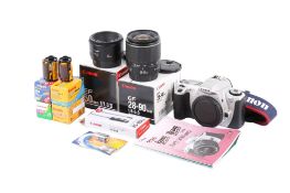 A Canon EOS 300 35mm SLR camera outfit. With two lenses; a Canon EF 28-90mm f4-5.