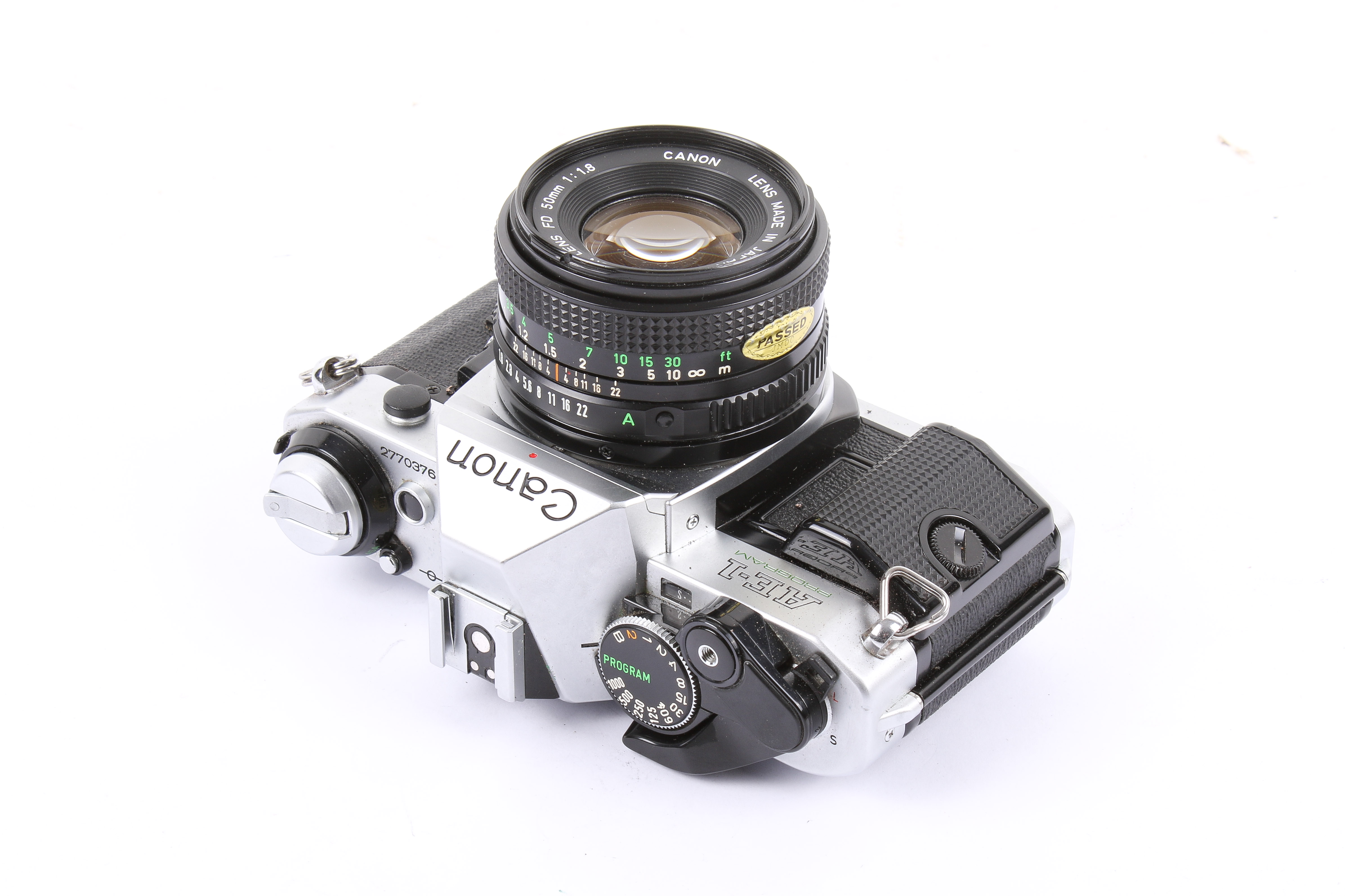 A Canon AE-1 Program 35mm SLR camera outfit. Chrome. Serial number 2770376. - Image 3 of 6