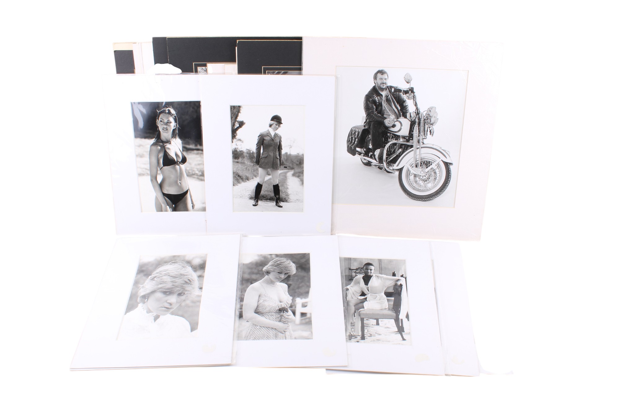 A collection of black and white and colour photographs.