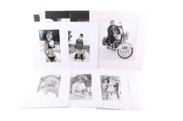 A collection of black and white and colour photographs.