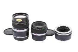 Two Olympus OM Zuiko Auto-Macro lenses.