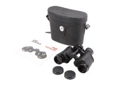 A pair of Asahi Pentax prism binoculars. 8x30 field 7.