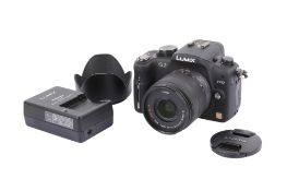 A Panasonic Lumix G2 Digital Mirrorless camera. With a Lumix 14-42mm f3.5-5.