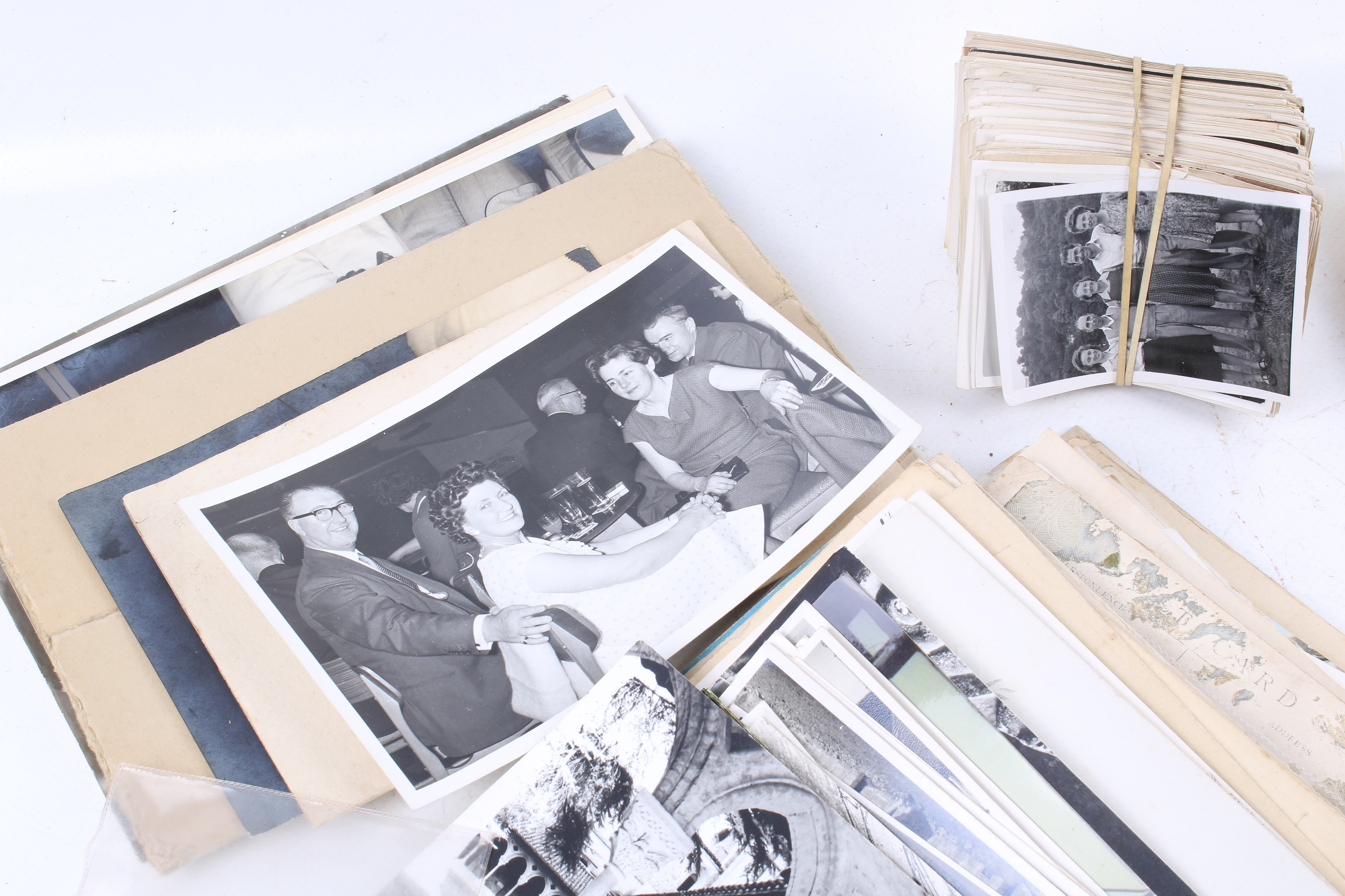 A box of antique and vintage photographs and postcards. - Image 2 of 4