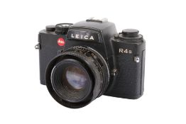 A Leitz Portugal Leica R4S 35mm SLR Camera. Black. Serial number 1652762.