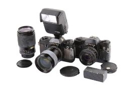 A Contax 137 MA Quartz 35mm SLR camera outfit. Two bodies; Black, Serial numbers 060243 & 038216.