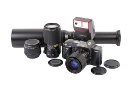 A Canon T70 35mm SLR camera outfit. Serial number 1278763.