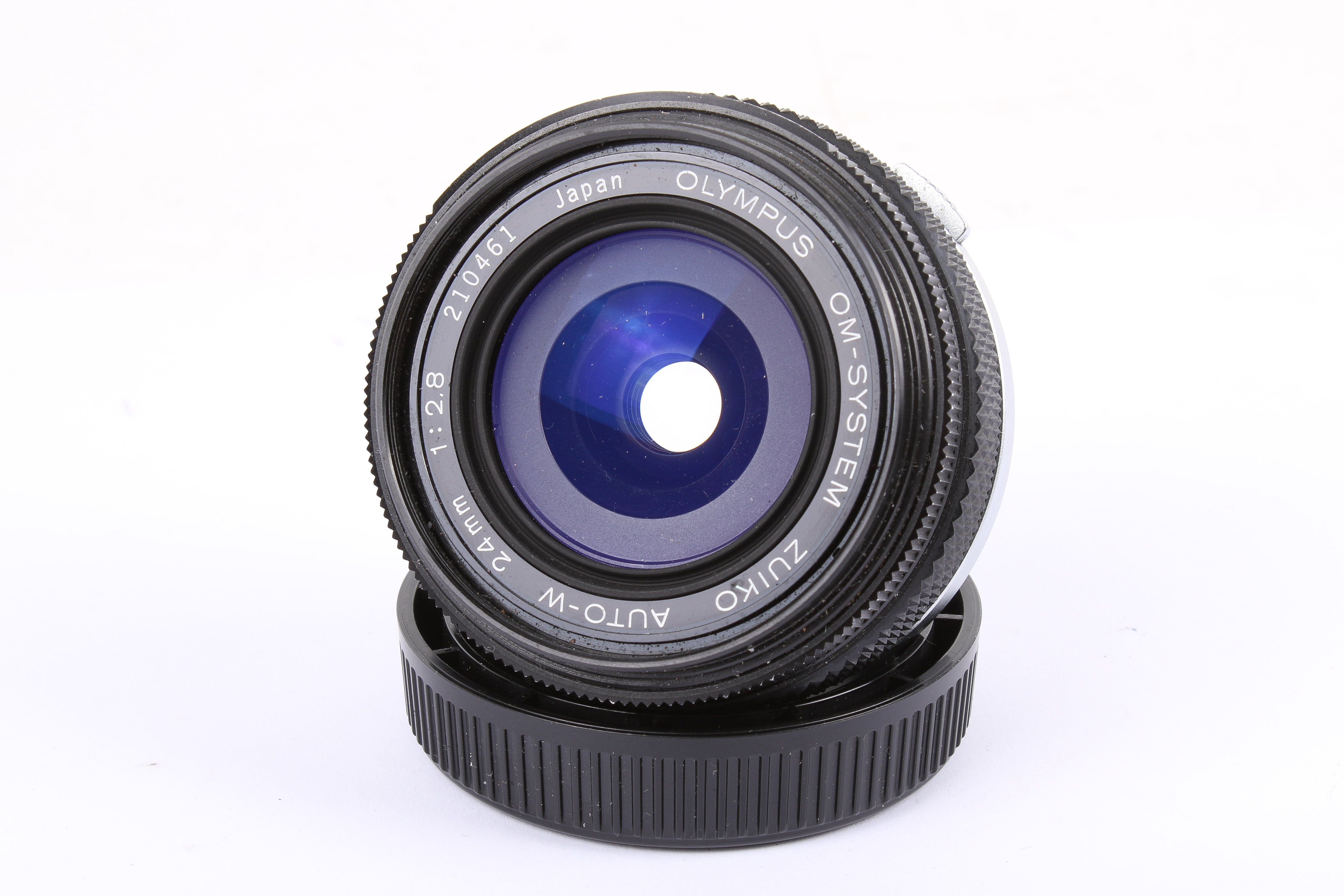 Three Olympus OM-mount lenses. To include an Olympus OM 24mm f2. - Image 2 of 4