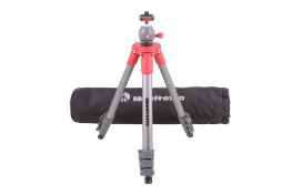 A Manfrotto Compact Light camera tripod. Serial number T0544698. With carry bag.