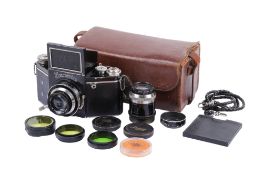 An Ihagee Exakta B 127 VP SLR camera outfit. Black. Serial number 487828.