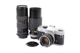 A Canon TLb 35mm SLR camera outfit. Chrome. Serial number 128684.