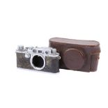 A Leitz Wetzlar Leica IIIc 35mm rangefinder camera body. Chrome. Serial number 395102.