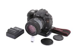 A Sigma SD14 Digital SLR camera. With a Sigma 18-50mm f2.