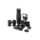 A Canon A-1 35mm SLR camera outfit. Black. Serial number 2005931.