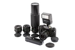 A Canon A-1 35mm SLR camera outfit. Black. Serial number 2005931.