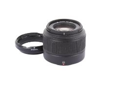 A Fujifilm 35mm f2 XC Fujinon Aspherical lens. Optics VG. Missing caps.