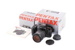 A Pentax Z-10 35mm SLR camera. Black. Serial number 5700416. With a Pentax-FA 28-80mm f3.5-4.