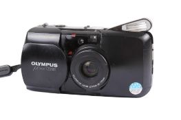 An Olympus MJU Zoom 35mm compact camera. Black. Serial number 6469761.