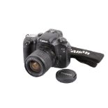 A Canon EOS 33 35mm SLR camera. With a Canon Zoom EF 28-90mm f4-5.6 II lens, lens cap and strap.