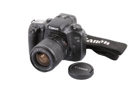 A Canon EOS 33 35mm SLR camera. With a Canon Zoom EF 28-90mm f4-5.6 II lens, lens cap and strap.